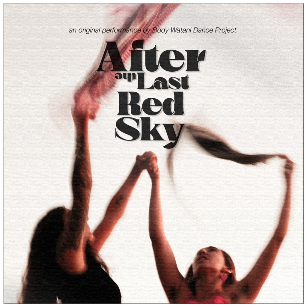 Leila and Noelle Awadallah reaching towards the sky. Palestinian kuffiyehs blow in the wind above